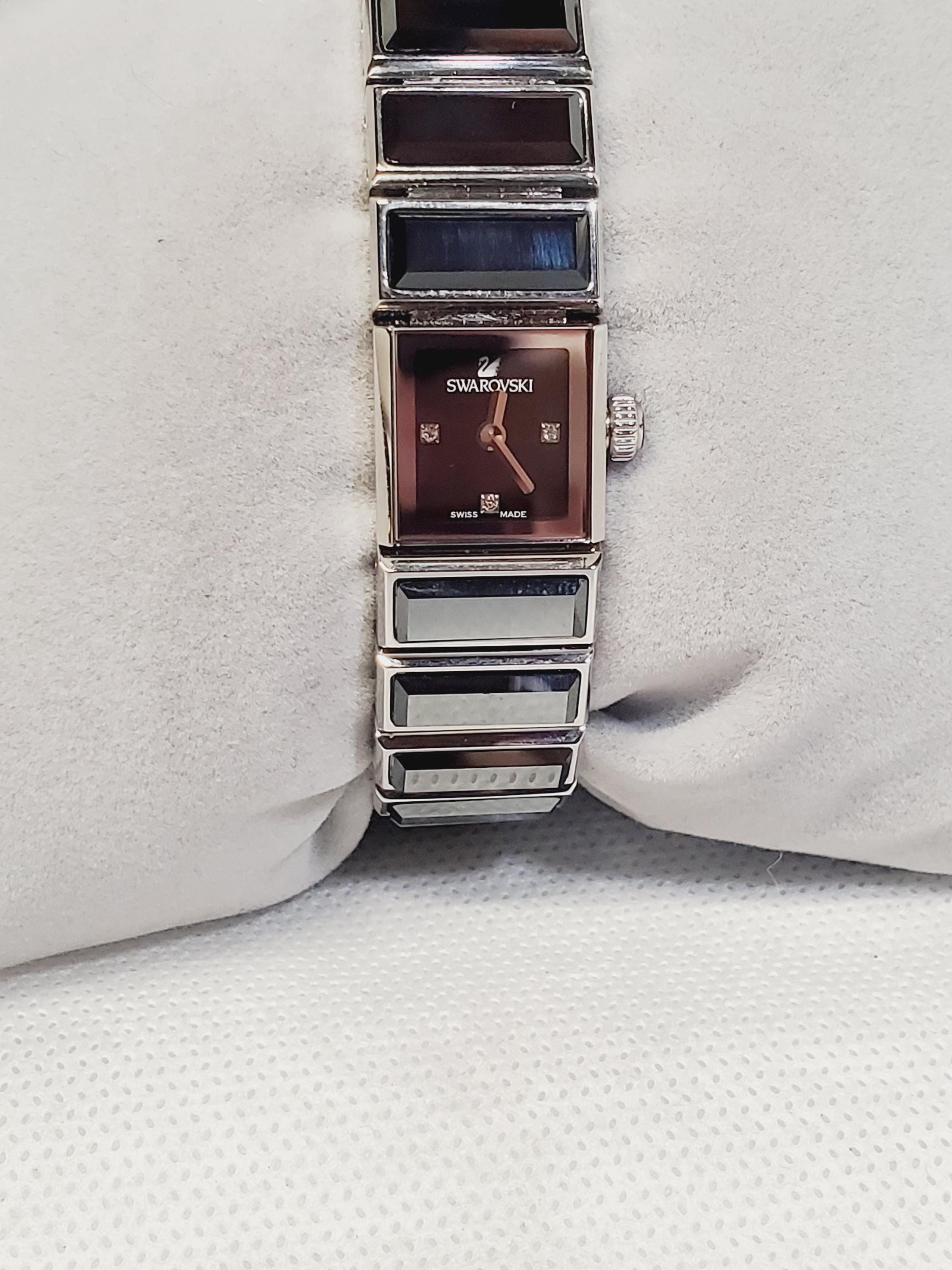 Swarovski Baguette Ladies Watch: Silver Square Crystal Bezel 