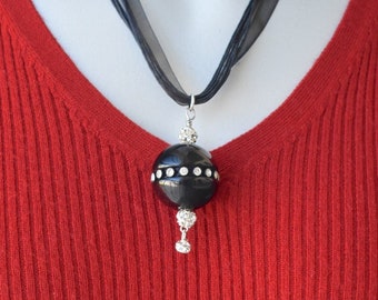 Big Bakelite Bead with Rhinestones and Rhinestone Beads on Ribbon and Cord Necklace