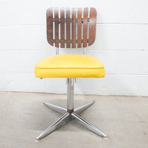Midcentury Rotating Vinyl Chair with Slatted Wood Back and Chrome Base image 1