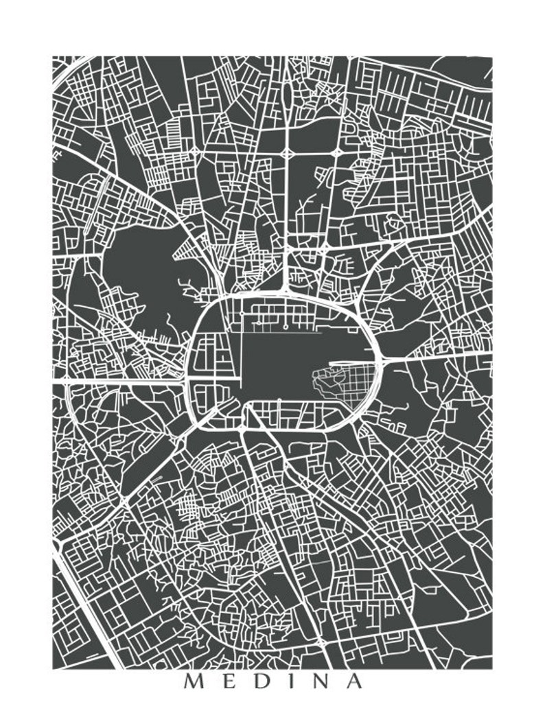 May include: A minimalist black and white map of Medina, featuring a detailed street layout. The city's name is printed in a clean, sans-serif font at the bottom. The map's design highlights the urban grid and key landmarks.