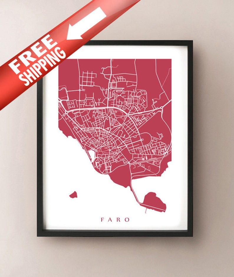 May include: Framed print featuring a map of Faro, Portugal, in a minimalist style. The map is rendered in white lines against a deep red background. The word "FARO" is printed in white at the bottom.