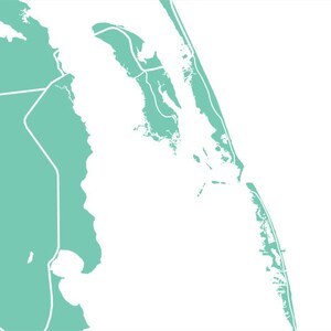 May include: A teal and white map of a coastal region, featuring landmasses and waterways. The map has a minimalist design with white outlines defining the land and water boundaries. The overall shape suggests a geographical representation.