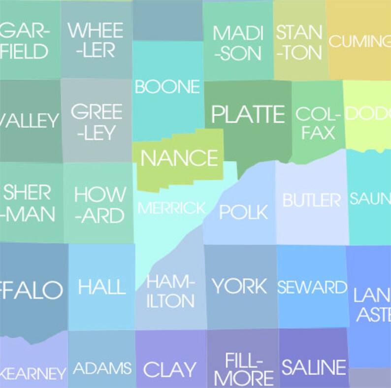 May include: A colorful map featuring county names in white text against various pastel-colored rectangular shapes. Counties like Nance, Polk, and Hall are visible. The map is a graphic representation of a geographical area.