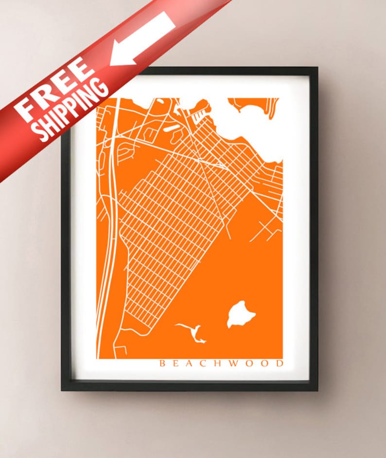 May include: Framed print featuring a detailed white map of Beachwood, Ohio, set against a vibrant orange background. The map is encased in a black frame. The word "BEACHWOOD" is printed in white at the bottom.