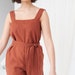 see more listings in the JUMPSUITS section