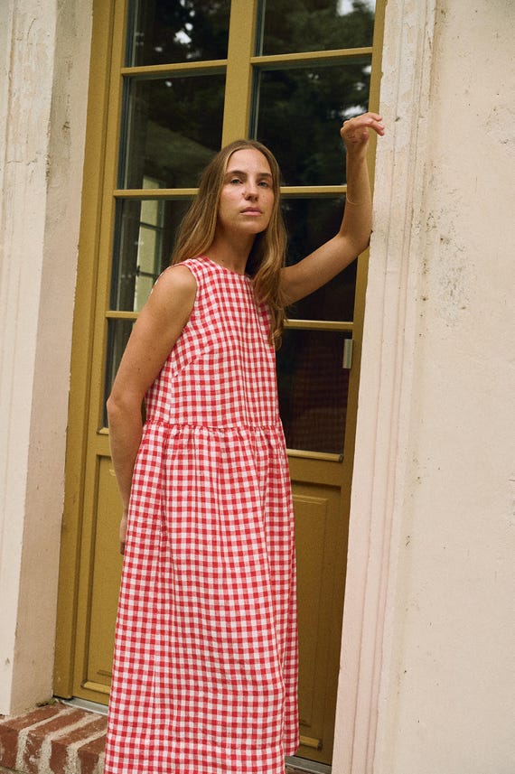red checkered dress Sweet Cherry Plaid Midi | Trendy Women's Dress The tie back and ruffle sleeve details add a touch of femininity to the classic poplin style The Red Boat Neck Plaid