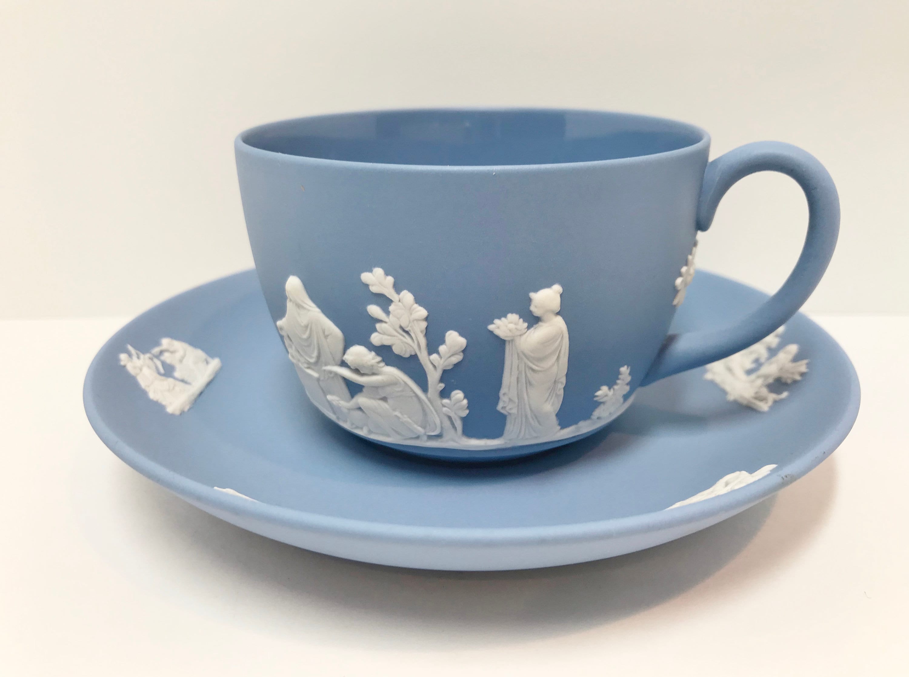 tea cup with wooden saucer