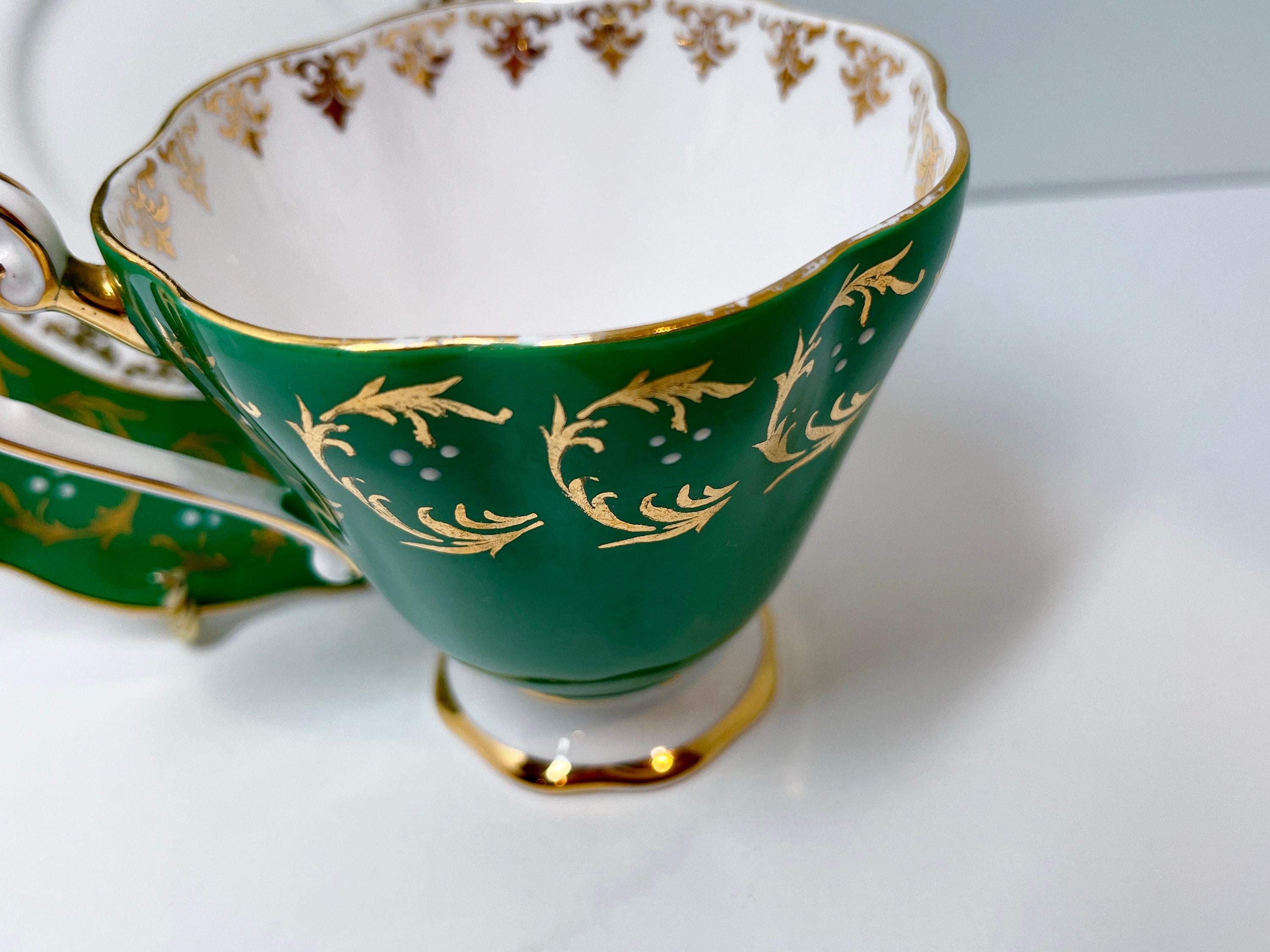 Vintage Tea Cup and Saucer,marking on bottom,green/gold,excellent cond