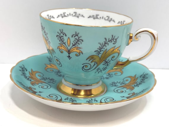 Tuscan Teacup and Saucer: Aqua and Gold Design