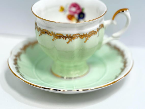 Crown Staffordshire Teacup and Saucer: Green Floral with Gold Trim