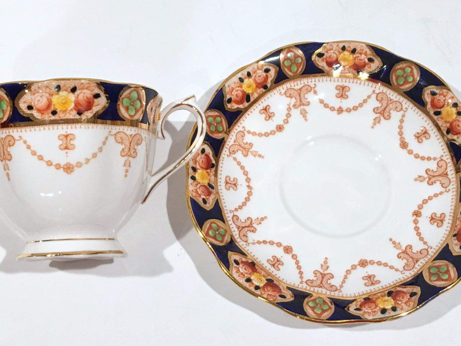 Elegant Royal Albert Tea and Saucer, Antique China, Navy Gold Cups