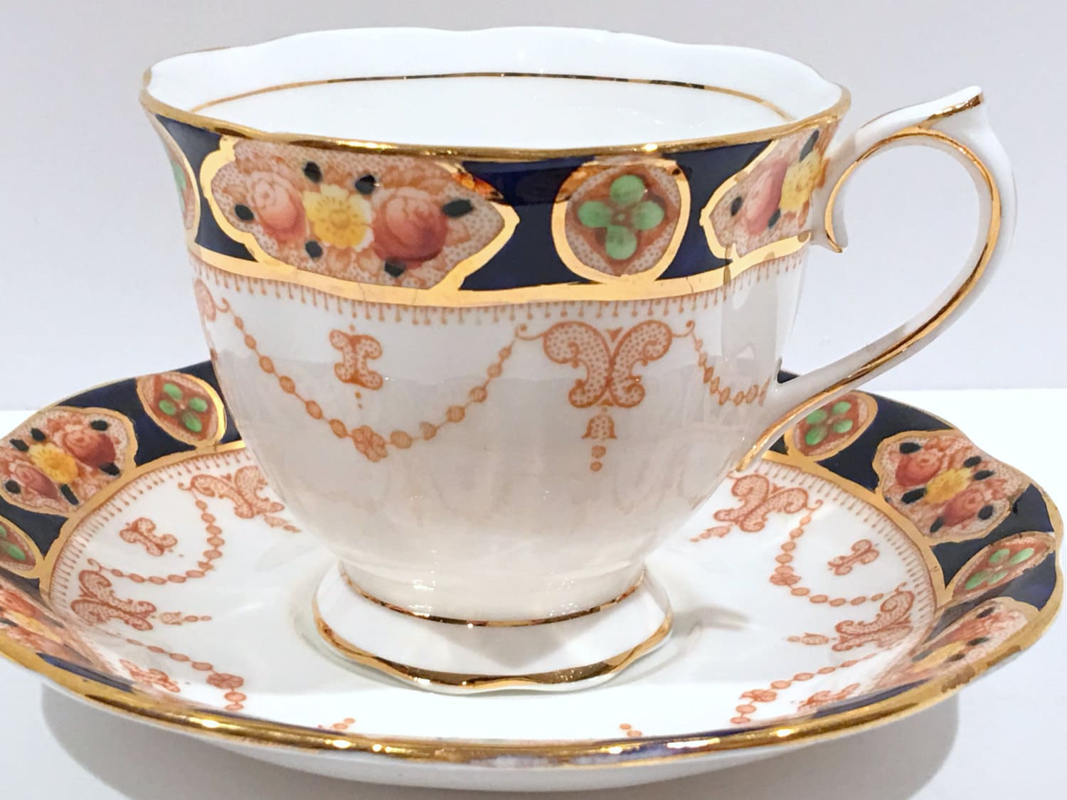 Elegant Royal Albert Tea and Saucer, Antique China, Navy Gold Cups