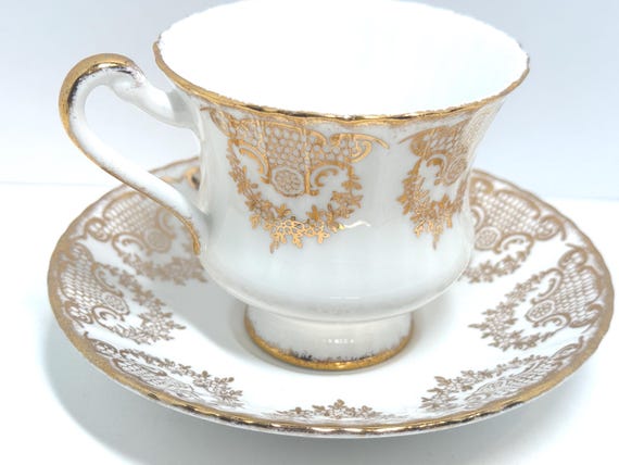 Paragon Teacup and Saucer: Vintage Gold Bone China Pattern
