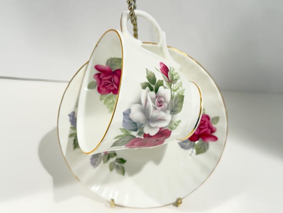 Royal Court Fine Bone China Teacup and Saucer: Roses Design