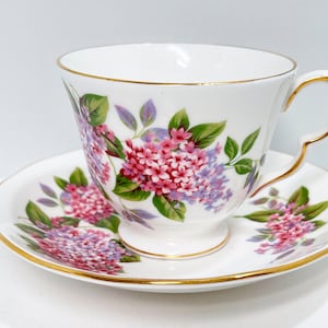 Queen Anne Lilac Floral Teacup and Saucer: Gold Trimmed Bone China