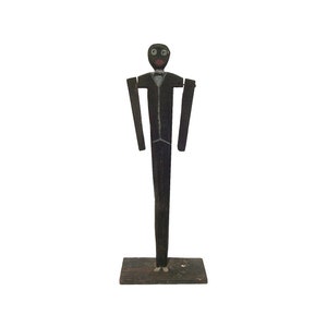 A stylized carved man with jointed arms. He resembles a so-called &quot;Dancing Dan&quot; with a sort of &quot;Art Deco&quot; look. (Offers Considered)