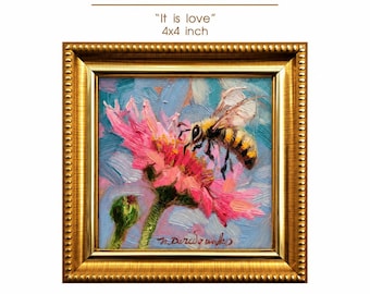 May include: An oil painting titled "It is love" measuring 4x4 inches, featuring a bee on a pink flower against a blue background, encased in a gold frame. The text "100% HAND-PAINTED" is visible above the artwork.