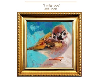 Puede incluir: Una obra de arte pintada a mano de un pájaro en un marco dorado. La pintura presenta un gorrión con plumas marrones, naranjas y blancas sobre un fondo turquesa. El marco mide 10x10 cm y el texto dice "I miss you".