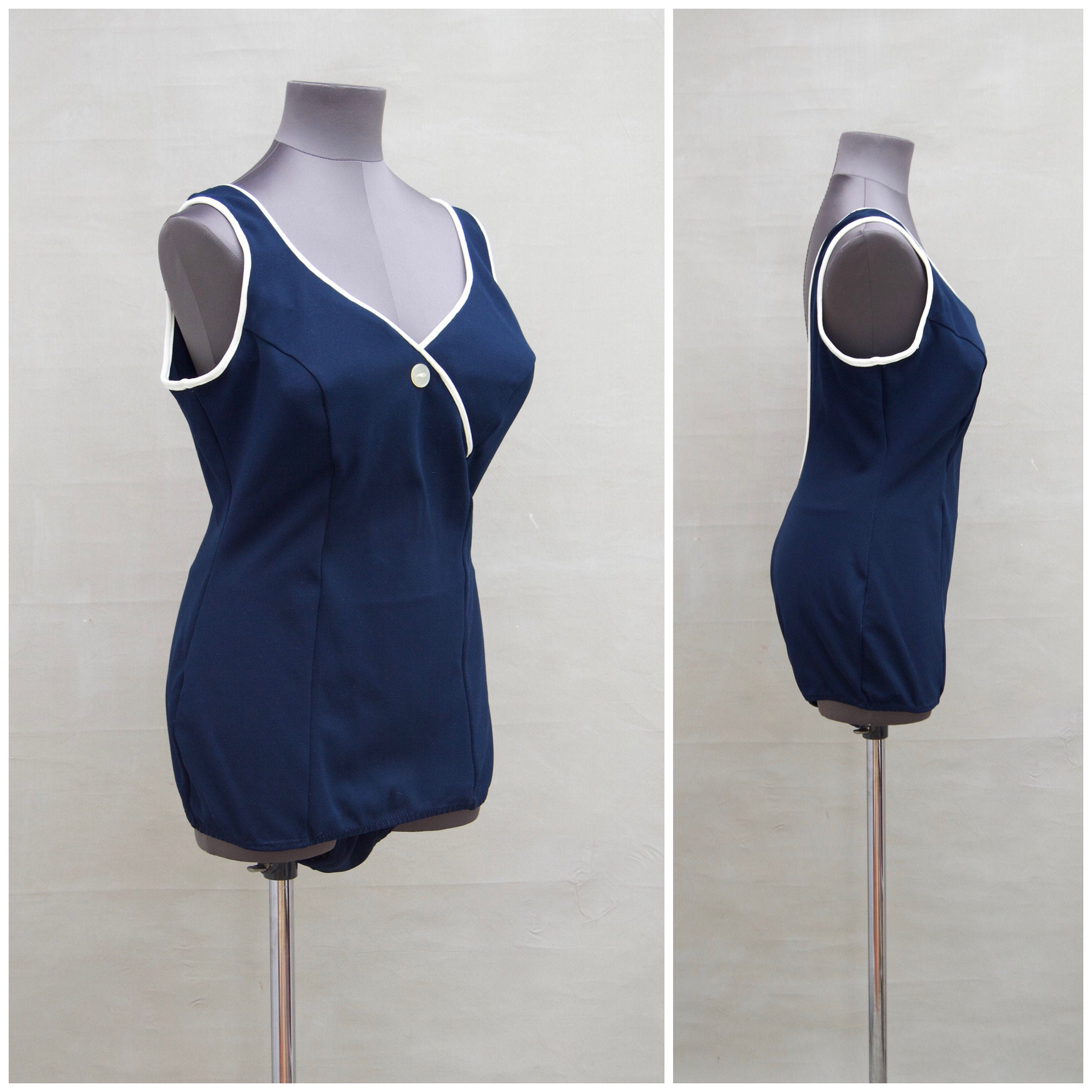 navy and white swimming costume
