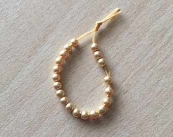 sachet de perles de Swarovski couleur gold