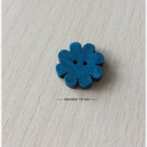 pretty little blue flower shaped wooden button 18mm diameter