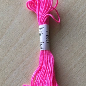 Silk skeins of fluorescent pink Algiers