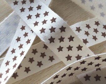 decorative Ribbon: "chocolate stars" on an ecru background