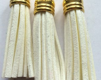 Suede tassel white ecru on tip of metal with ring