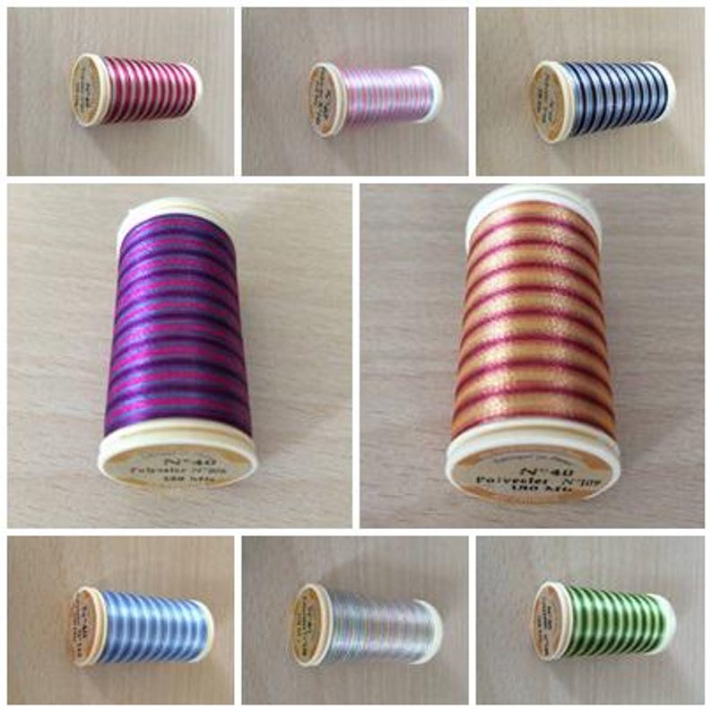 May include: A collection of ten spools of thread in various colors and patterns. The spools are all the same size and shape, and they are made of a white plastic material. The thread is wound around the spools, and the ends of the thread are visible. The spools are arranged in a grid pattern, with three rows and four columns.