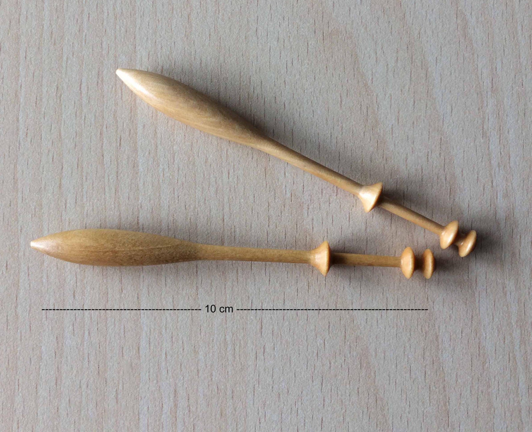 04 spindles in charm for making lace