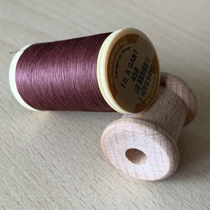 Spule Handschuhgarn Farbe 535 Granat