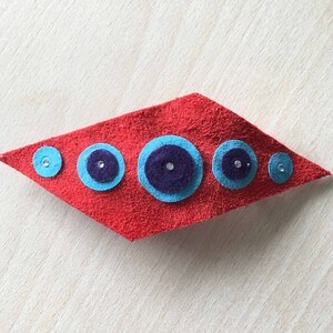 Diamond-shaped leather barrette