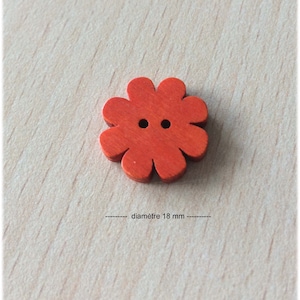 pretty little orange wooden flower shaped button 18mm diameter