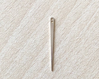 needle for metal blade. gold embroidery