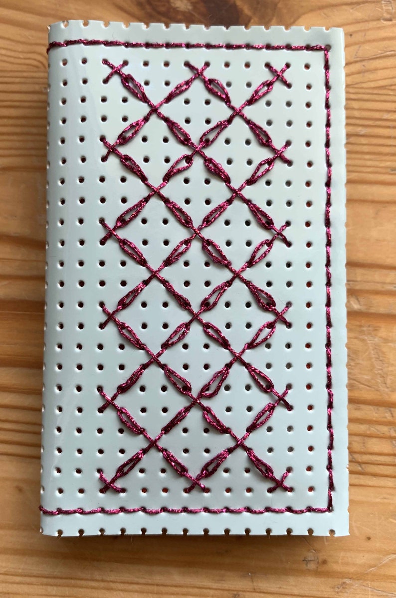 Vinyl lacquered perforated porcelain pink