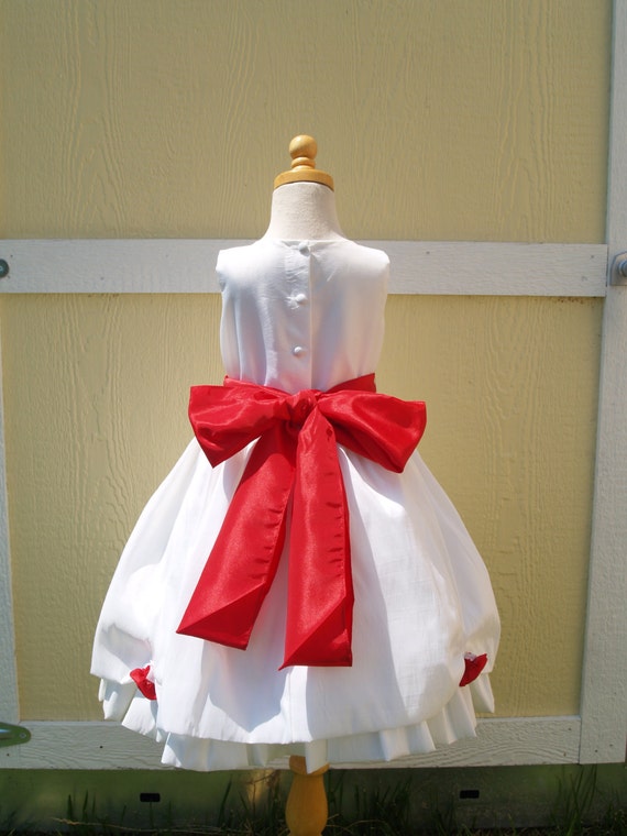 White dress hotsell with red sash