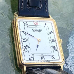 Seiko "Tank" Ladies Unisex Gold Tone w/ White Dial & Roman Numerals Quartz Watch