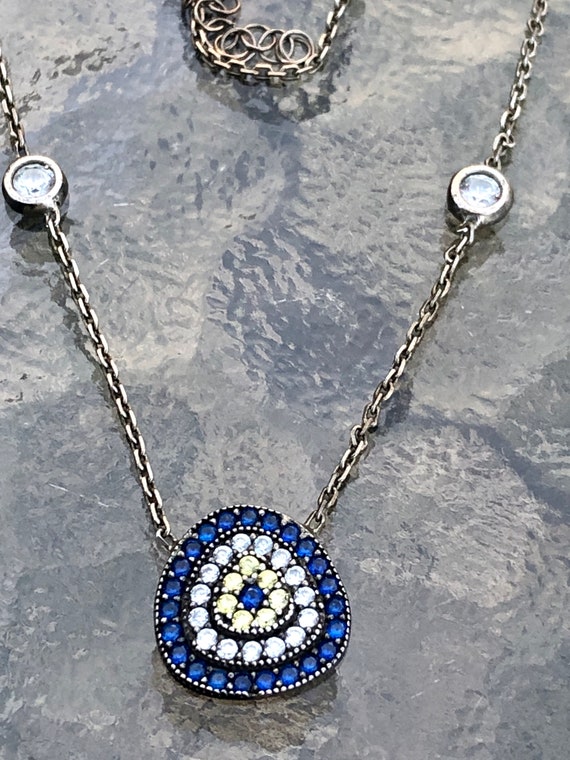 ヴィンテージスワロフスキーを使用したペンダントトップ 不思議な変色