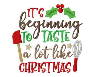 May include: It's beginning to taste a lot like Christmas embroidery design featuring a red spatula, a white whisk, and a green holly sprig with red berries.