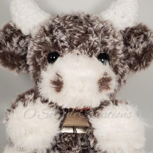 fluffy brown cow stuffed animal