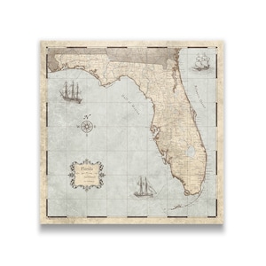 May include: A vintage-style map of Florida, featuring a sepia-toned color palette with nautical elements. The map includes illustrations of sailing ships, a compass rose, and the state's name in an ornate frame. The background has a grid pattern.