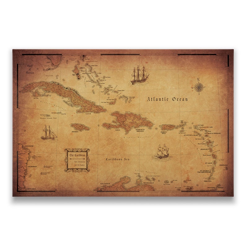 May include: An antique-style map of the Caribbean Sea, showing the islands and surrounding waters. The map is labeled with the names of the islands and features a compass rose and several ships.