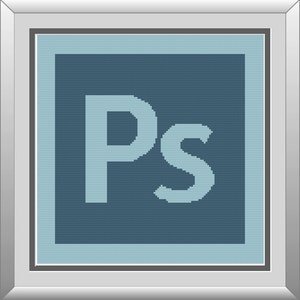 May include: A framed image of the Adobe Photoshop logo, featuring the letters "Ps" in a light blue colour against a dark blue background.