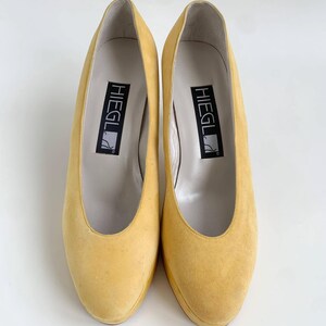 vintage HIEGL yellow suede platform pump with ostrich leather on platform and heel.