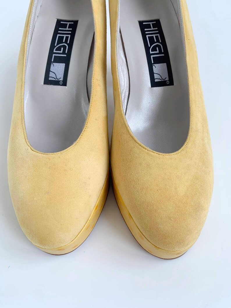 vintage HIEGL yellow suede platform pump with ostrich leather on platform and heel.