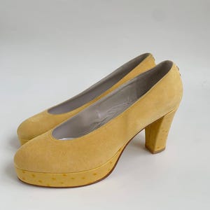 vintage HIEGL yellow suede platform pump with ostrich leather on platform and heel.