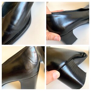 May include: Black leather pumps with a square toe and a block heel. The shoes have a glossy finish and a classic design, suitable for various occasions. The heel height appears to be approximately 2 inches.