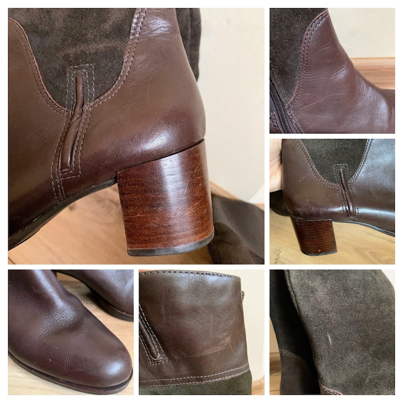 May include: A pair of brown leather knee-high boots with a suede upper and a wooden heel.
