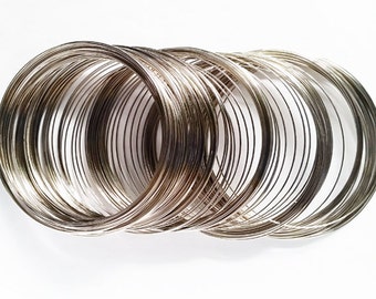 50 öglor silverfärgad minnespärltråd 70 mm-75 mm diameter smyckesdetaljer STMW70-50WD2