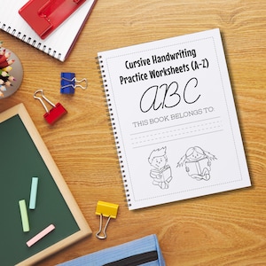 May include: A spiral-bound notebook with the text "Cursive Handwriting Practice Worksheets (A-Z)" and "ABC". The notebook also includes the text "THIS BOOK BELONGS TO:" and illustrations of children reading. Other items include a chalkboard, colored pencils, and binder clips.